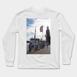 An old steamboat arrives at a pier in the Swedish capital Stockholm Long Sleeve T-Shirt